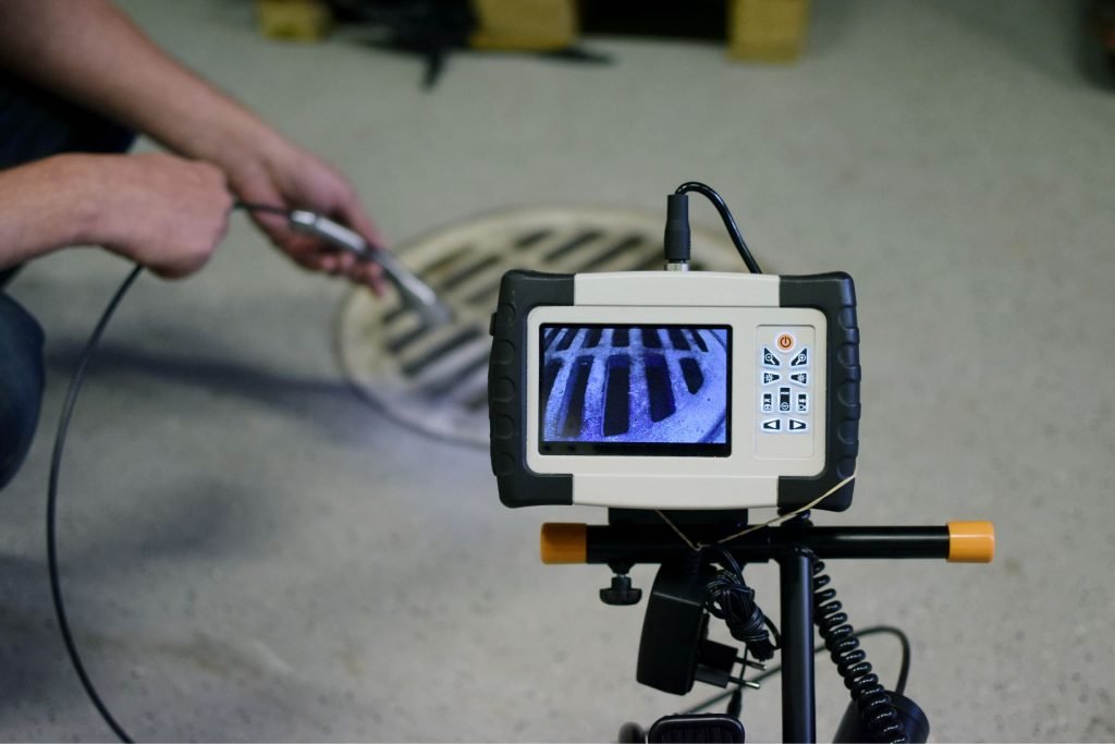 Inspection camera showing drain interior view.